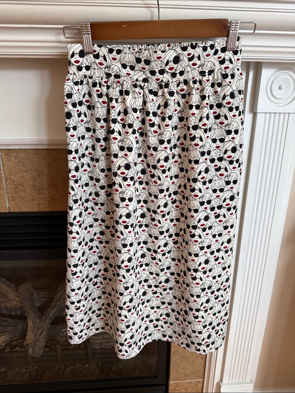 White Printed Midi Skirt with Black Sunglasses Motif and Red Accents